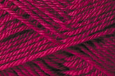 A close-up of deep pink Jo Sharp Classic DK Wool from Kingfisher Yarn & Fibre, wound tightly in a crisscross pattern, showcasing the texture and individual strands. The color appears rich and vibrant, with mild variations in shade due to lighting and the twist of the fibers.