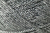 Close-up shot of a ball of light gray Jo Sharp Classic DK Wool from Kingfisher Yarn & Fibre, showcasing the texture and twisted strands. The yarn appears soft and thick, suitable for knitting or crocheting with its versatile DK gauge, promising premium grade wool quality.