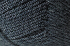 Close-up view of a skein of Jo Sharp Classic DK Wool by Kingfisher Yarn & Fibre. The texture showcases tightly wound fibers with a slightly heathered appearance, highlighting the intricate details and softness of the premium-grade wool, perfect for versatile DK gauge projects.