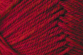 Close-up image of red yarn with visible fibers and strands twisted together, showing a textured pattern. The yarn appears soft and tightly spun, ideal for knitting or crocheting projects. This Jo Sharp Classic DK Wool by Kingfisher Yarn & Fibre showcases a vibrant red with subtle variations in shade, perfect for versatile DK gauge creations.