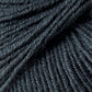 Close-up of Jo Sharp Mulberry Silk Georgette Yarn by Kingfisher Yarn & Fibre, showcasing detailed fibers and strands woven together. The yarn, in a dark grey hue, appears soft and slightly hairy, making it ideal for knitting or crocheting heirloom projects. The image captures the intricate details and depth of this extrafine Merino wool blend yarn.