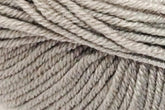 A close-up image of a skein of Jo Sharp Mulberry Silk Georgette Yarn by Kingfisher Yarn & Fibre. The yarn, made from Extrafine Merino Wool, is wound tightly, and the texture shows a smooth twist with slight sheen. The color appears uniform throughout, providing a soft and neutral tone perfect for heirloom items.