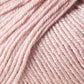 Close-up image of a ball of Jo Sharp Mulberry Silk Georgette yarn by Kingfisher Yarn & Fibre, revealing the texture and details of the tightly wound pale pink strands. The yarn appears soft and smooth, suggesting a blend that includes Extrafine Merino Wool. The strands are neatly coiled and ready for knitting or crocheting heirloom items.