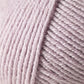 Close-up image of a ball of Jo Sharp Mulberry Silk Georgette Yarn by Kingfisher Yarn & Fibre. The strands are neatly wound around each other, creating a textured, ribbed pattern that highlights the softness and gentle light pink color—perfect for crafting heirloom items.