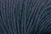 Close-up photograph of dark gray, slightly textured yarn. The fibers appear thick and tightly twisted, creating a consistent, smooth surface. Made from Extrafine Merino Wool, the yarn has a matte finish and the individual threads can be seen intertwining with one another.

Jo Sharp Mulberry Silk Georgette Yarn by Kingfisher Yarn & Fibre.