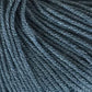 Close-up view of a skein of Jo Sharp Mulberry Silk Georgette Yarn by Kingfisher Yarn & Fibre, showcasing the tightly wound strands and soft texture.