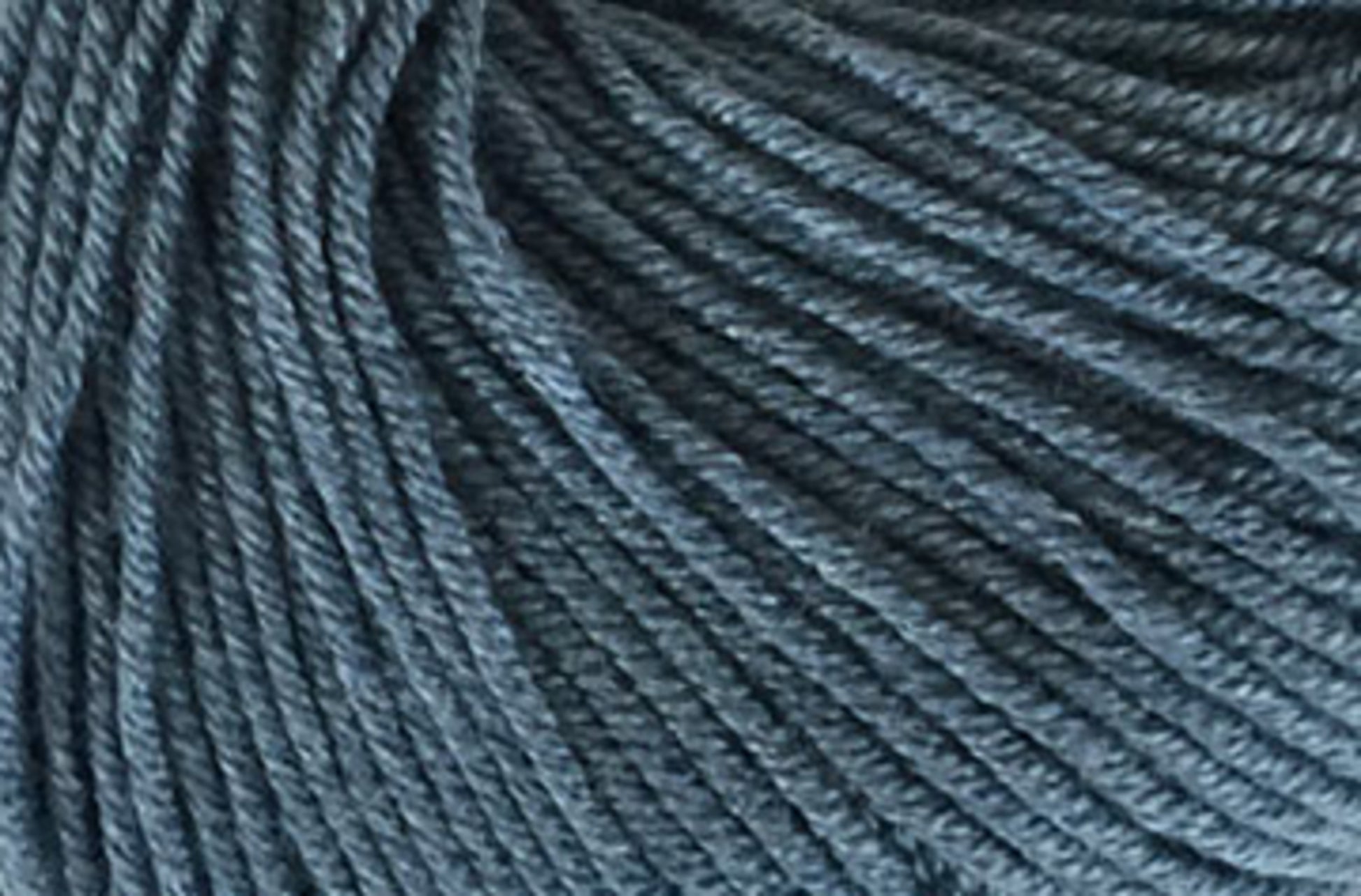 Close-up view of a skein of Jo Sharp Mulberry Silk Georgette Yarn by Kingfisher Yarn & Fibre, showcasing the tightly wound strands and soft texture.