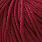 Close-up image of Jo Sharp Mulberry Silk Georgette Yarn by Kingfisher Yarn & Fibre. The yarn fibers are tightly wound, showcasing the deep burgundy hue and soft texture—ideal for crafting heirloom items that will be cherished for generations.