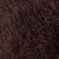 Close-up view of Jo Sharp Rare Comfort Kid Mohair from Kingfisher Yarn & Fibre, showcasing a dark brown, coarse, and curly textured material. The texture appears dense and fibrous, creating a rugged yet surprisingly soft appearance.