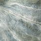 Close-up of light and wispy, semi-transparent fibers intertwined in an abstract pattern. The fibers have a soft, airy appearance, with shades of white and pale blue blending together, akin to Kingfisher Yarn & Fibre's Jo Sharp Rare Comfort Kid Mohair yarns, creating a delicate, ethereal texture.