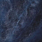 Close-up image of Jo Sharp Rare Comfort Kid Mohair by Kingfisher Yarn & Fibre, showcasing a dark blue and black textured surface. The fine, intertwined fibers create a slightly tangled appearance reminiscent of airy sweaters. The texture features a mix of light and dark shades, highlighting the material's depth and complexity.