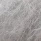 Close-up image of soft, fluffy, white and light gray fibers intertwined, resembling Jo Sharp Rare Comfort Kid Mohair by Kingfisher Yarn & Fibre. The texture of this luxurious yarn appears smooth and delicate, perfect for airy sweaters.