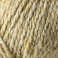 Close-up of a ball of luxurious yarn with rich tweed highlights, featuring slight variations in color and texture. Showcasing the soft, twisted fibers and natural appearance, the Kingfisher Yarn & Fibre's Jo Sharp Silkroad Aran Tweed appears thick and perfect for knitting or crocheting warm, cozy items.