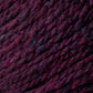 Close-up image of thick, dark burgundy Kingfisher Yarn & Fibre's Jo Sharp Silkroad Aran Tweed with subtle variations in color, displaying a textured, woven appearance. The yarn's fibers are slightly mottled, indicating a rich and soft texture that is suitable for knitting or crocheting.