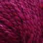 Close-up image of deep magenta-colored Kingfisher Yarn & Fibre Jo Sharp Silkroad Aran Tweed yarn, showing the texture and individual threads twisted together. The surface appears soft and woolly with rich tweed highlights, making it a luxurious yarn suitable for knitting or crocheting projects.