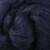 Close-up of a dark navy blue wool roving from Ashford Handicrafts Limited, tightly twisted to highlight the soft and textured spinning fibers of the Corriedale New Zealand Wool Fiber to Spin and Felt.