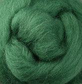 Close-up of Ashford Handicrafts Limited Corriedale New Zealand Wool Fiber to Spin and Felt, tightly wound in a circular pattern, showcasing its soft and fluffy texture perfect for felting.