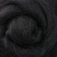 Close-up of dark, soft Corriedale New Zealand Wool Fiber to Spin and Felt by Ashford Handicrafts Limited, showcasing tightly spiraled strands that reveal a textured, fluffy surface with subtle color variations.