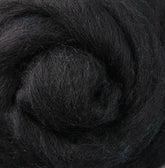 Close-up of dark, soft Corriedale New Zealand Wool Fiber to Spin and Felt by Ashford Handicrafts Limited, showcasing tightly spiraled strands that reveal a textured, fluffy surface with subtle color variations.