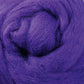 A detailed view of the Ashford Handicrafts Limited Corriedale New Zealand Wool Fiber to Spin and Felt, sold by the ounce, highlights its purple hue and soft, fluffy texture with a swirling pattern. The thick and smooth fibers are ideal for felting or spinning, forming a circular shape within the frame.