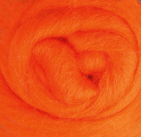 Close-up of soft, vibrant orange Corriedale New Zealand Wool Fiber from Ashford Handicrafts Limited, sold by the ounce, intricately rolled into a circular shape for a textured and cozy appearance.