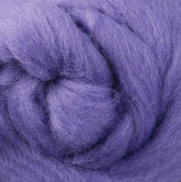 Close-up image of a tightly wound ball of Ashford Handicrafts Limited's Corriedale New Zealand Wool Fiber, available for spinning and felting. The soft, textured fibers are fluffy and intricately intertwined, highlighting the yarn's plush and cozy appearance, ideal for wool felting projects.