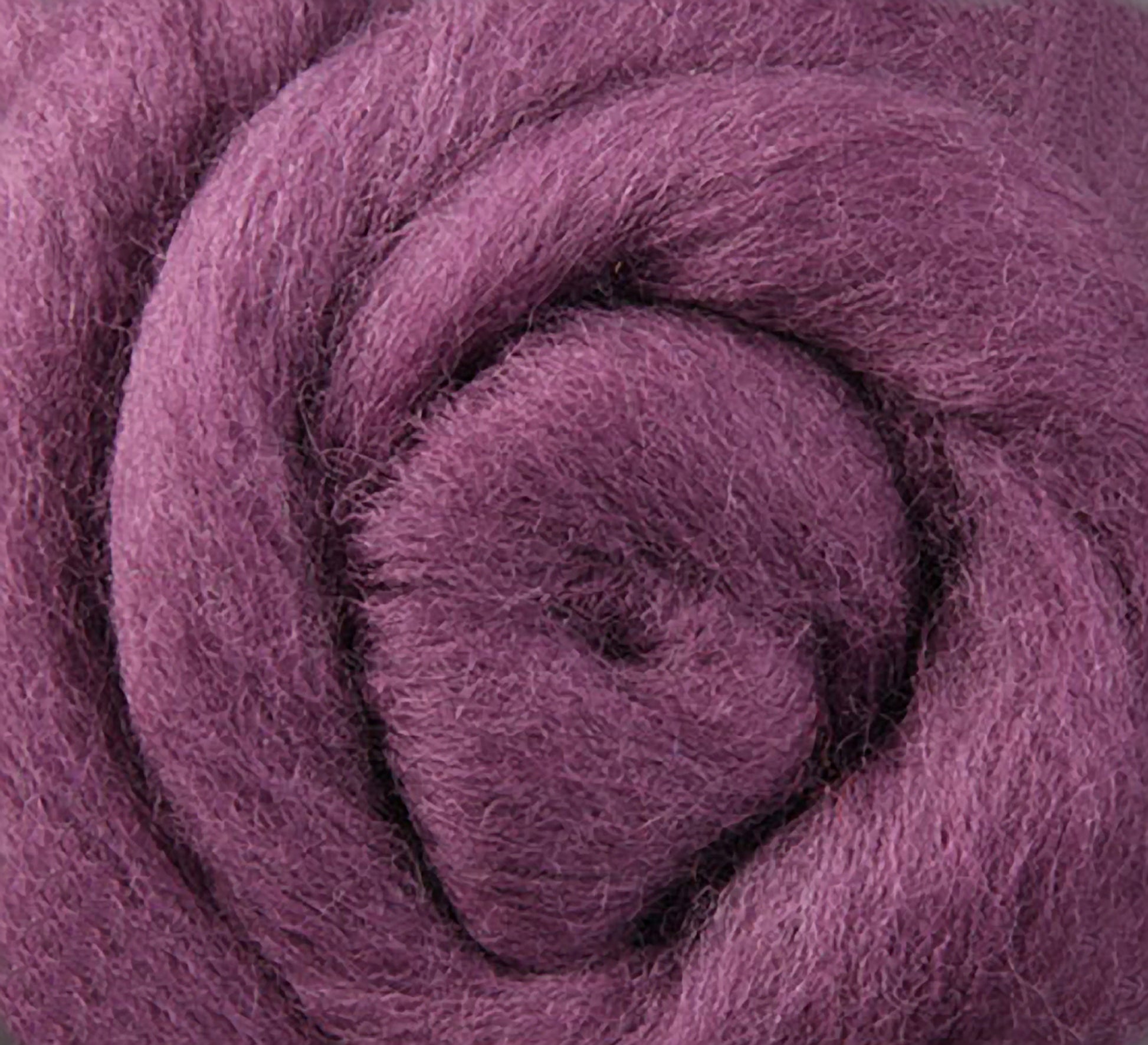 Close-up of Corriedale New Zealand wool fiber by Ashford Handicrafts Limited, rolled in a spiral to showcase its soft texture and rich purple color, available for spinning and felting by the ounce.