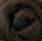 Close-up of a roll of Corriedale New Zealand Wool Fiber to Spin and Felt by Ashford Handicrafts Limited, highlighting its soft, fluffy texture and intricate layers. The wool's rich color and natural fibers give it a cozy and inviting appearance, ideal for spinning enthusiasts.