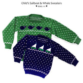 Two children's pullover sweaters from Yankee Knitter Designs are shown. The top sweater is green with a white and navy pattern of whales and dots. The bottom sweater is navy with a white and green pattern of sailboats and dots, both in classic styles. Text above the sweaters reads "Child's Sailboat & Whale Pullover Sweaters sizes 2-12.