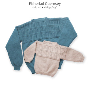 A teal Fisherlad Guernsey sweater for adults and a cream version for children, both from Yankee Knitter Designs' downloadable Fisherlad Guernsey pattern, are displayed side by side. The adult sweater features intricate knit and purl patterns on the upper section, while the child's version replicates the design on a smaller scale using worsted weight yarn.