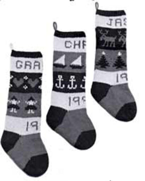 The Classic Christmas Stockings from Yankee Knitter Designs feature three individualized grayscale stockings, each beautifully adorned with unique patterns such as hearts, trees, anchors, sailboats, and reindeers. Handcrafted from worsted weight yarn, these traditional keepsakes are personalized with the names "GRAN," "CHAR," and "JAR," along with the partially visible year "199.