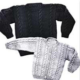 Two knitted sweaters by Yankee Knitter Designs: The top one is a black pullover child's cable sweater with a round neck, while the bottom one is a light gray cardigan with buttons down the front and a V-neck. Both are spread out to showcase their design, offering an introduction to cables for those interested in child sizes from the "Child's Cable Sweater, Pullover & Cardigan" collection.