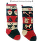 Two Traditional Christmas Stockings by Yankee Knitter Designs feature festive design bands. The left stocking showcases Santa faces, Christmas trees, and reindeer in three colors, while the right stocking displays candy canes, Santa faces, and a jolly snowman with a red nose and scarf.