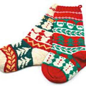 The Nancy Lindberg Christmas Socks Stocking features a pair of socks adorned with charming holiday designs, showcasing festive icons such as snowmen, Christmas trees, gingerbread men, and snowflakes. The vibrant patterns in red, green, white, and yellow make each sock distinct—one predominantly red and green while the other is primarily white and green.