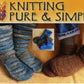 A knitting pattern cover showcases two pairs of feet wearing warm winter footwear in hand-knitted socks, featuring shades of blue and brown. Above the feet, it reads "Bryson Distributing, Inc." with a heart-shaped yarn design. A smaller image in the center displays three more pairs of knitted socks, perfect for Adult Mukluk Slippers or adding suede soles.