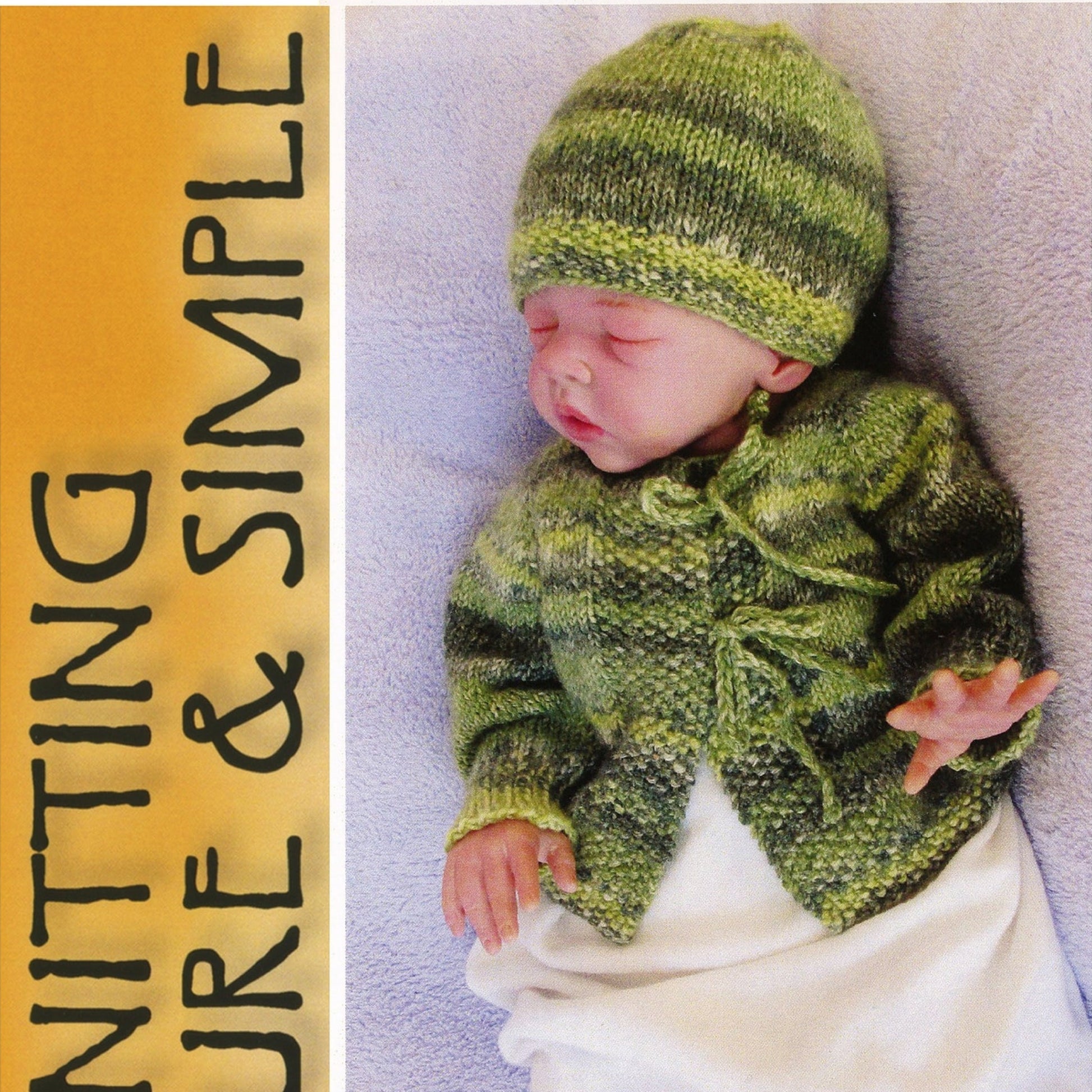 A sleeping baby rests peacefully on a soft surface, dressed in a cozy green knitted hat, matching sweater, and adorable knit booties from the Newborn Layette collection by Bryson Distributing, Inc. To the left of the scene is a vertical yellow banner featuring black text that reads, "KNITTING PURE & SIMPLE." The baby looks serene and content.