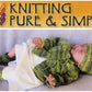 A sleeping baby is dressed in matching green knit booties, a newborn cardigan, and a cozy hat from the Newborn Layette collection by Bryson Distributing, Inc., all crafted from fingering weight yarn. They lie on a soft white blanket. Above the baby, the text "Knitting Pure & Simple" is displayed with a colorful knitting pattern design.