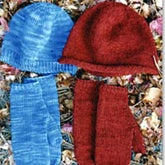 A Bryson Distributing, Inc. Basic Hat & Mitten Set for Women in blue lies beside a red Bryson Distributing, Inc. Basic Hat & Mitten Set for Women on a ground covered with dried leaves.