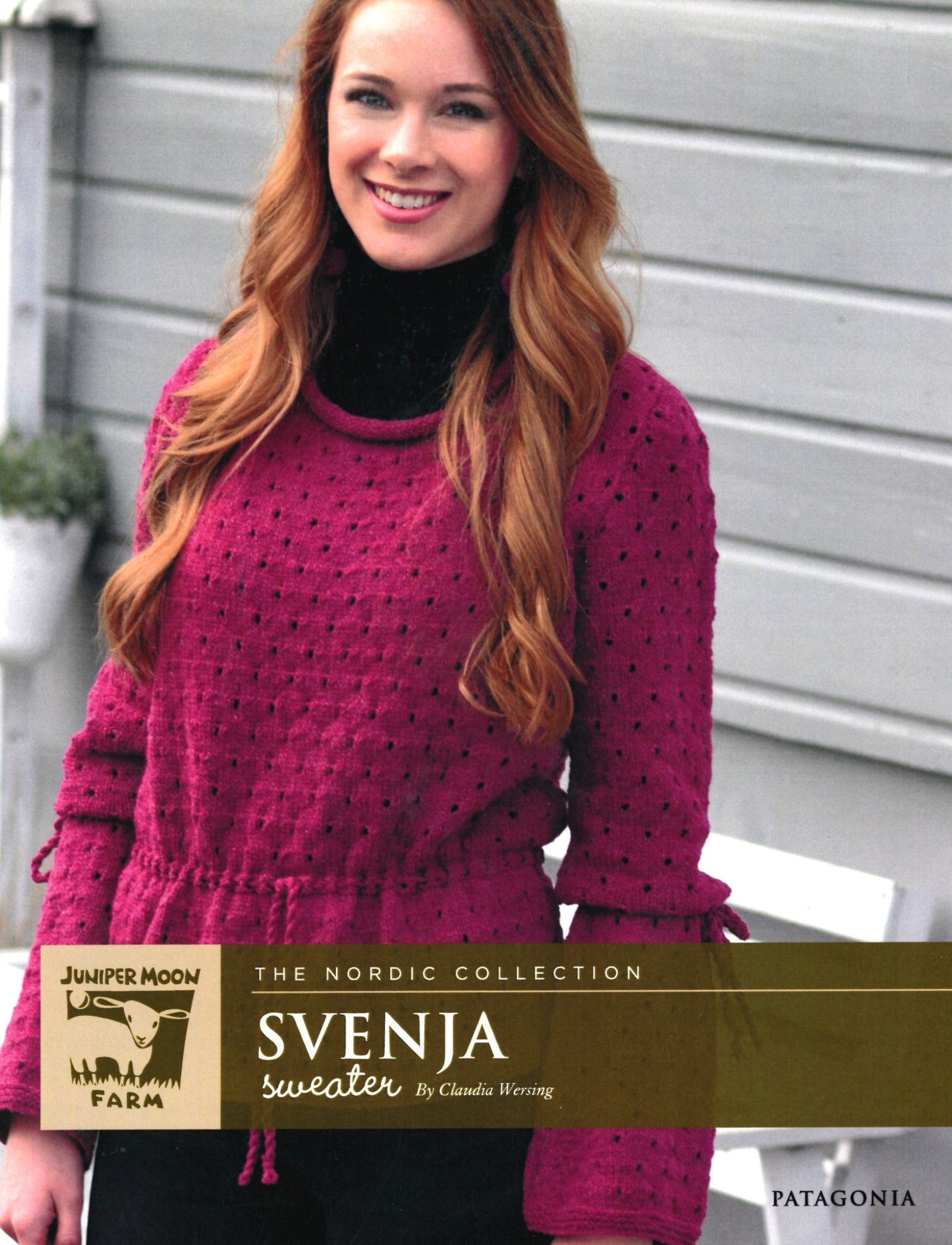 A woman with long, wavy red hair is smiling and wearing a dark magenta sweater with black accents and a dotted texture. The sweater, crafted from organic merino yarn, is called the "Svenja" sweater by Claudia Wersing and is part of Juniper Moon Farm's Nordic Collection under the Knitting Fever / Euro Yarns brand. The word "Patagonia" appears in the corner.