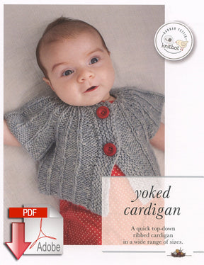 A baby with a light skin tone is lying down, wearing a gray, hand-knit top-down yoke cardigan from Never Not Knitting. The cardigan features two large red buttons. The baby is looking up with a slight smile. Text on the image reads "Knitbot Yoked Cardigan” and "A quick top-down ribbed cardigan in a wide range of sizes." An Adobe PDF icon is present at the bottom left indicating the download option.