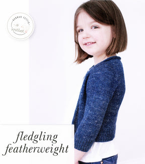 A young girl with shoulder-length brown hair is standing against a white background, smiling softly. She is wearing a Knitbot Fledgling Featherweight Cardigan by Never Not Knitting over a white shirt. The text on the image reads "fledgling featherweight," showcasing this delicate design by Hannah Fettig.