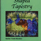 Cover of the book "Shaped Tapestry 2nd Edition" by Kathe Todd-Hooker, published by Fine Fiber Press. The cover is green and showcases an intricate non-rectangular tapestry with vibrant colors including blue, green, and black, featuring a detailed abstract design. The book is spiral-bound.