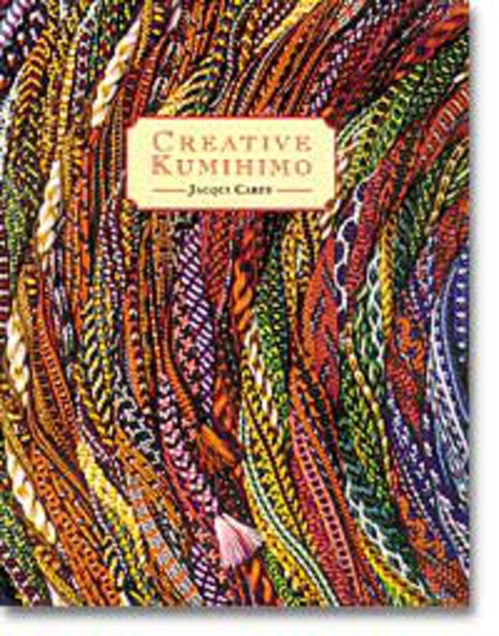 The cover of the Lacis book "Creative Kumihimo" features an intricate pattern of variously colored braided cords. The vibrant shades of red, orange, yellow, green, blue, and purple beautifully showcase the art of Japanese braiding.