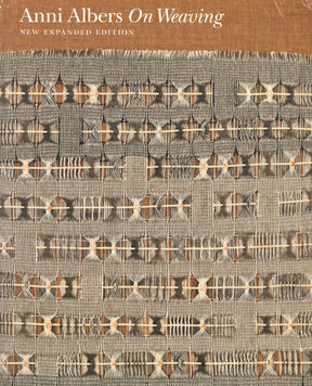 Cover of "On Weaving - New Expanded Edition" by Anni Albers, published by Ingram Content. The design features a textured, intricate weaving pattern in neutral tones, showcasing various textile fundamentals. The title is positioned at the top left in white text, set against a solid brown background, reflecting Bauhaus influences.