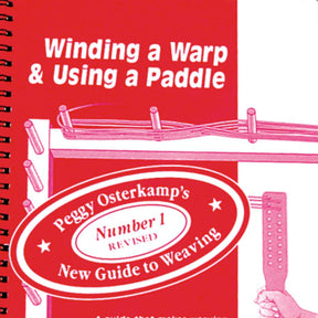 Cover of the book *Winding a Warp & Using a Paddle* by Peggy Osterkamp, published by Lease Sticks Press. The cover features a red background with white and pink text and graphics depicting a warp and paddle. A label on the cover reads, "Peggy Osterkamp's Number 1 Revised New Guide to Weaving." This is the perfect addition to your weaving library for mastering the warp winding process.