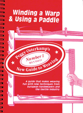 The cover of a spiral-bound book titled "Winding a Warp & Using a Paddle" by Peggy Osterkamp, published by Lease Sticks Press, is labeled "Number 1 Revised New Guide to Weaving". It features a hand holding a weaving paddle, which is crucial for mastering the warp winding process. The background is red and white, adorned with diagrams of various weaving techniques.