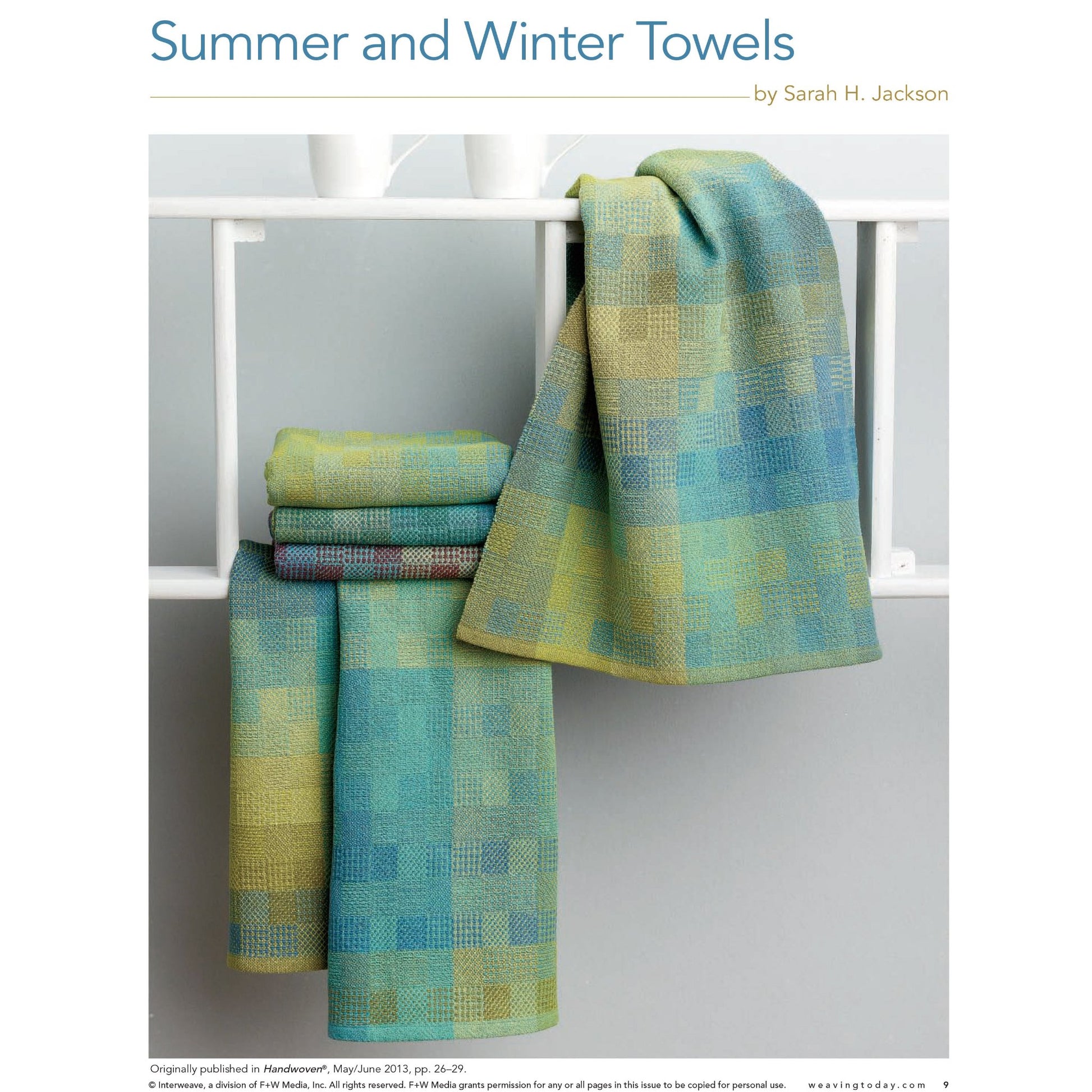 A set of vibrant towels in hues of blue, green, and yellow are draped over a white wooden rack. The towels showcase a checkered pattern against a light gray wall. At the top, the title "Handwoven Special Pattern Collection – 5 Towels on 4-Shafts - eBook printed copy" is displayed along with credit to Long Thread Media and Sarah H. Jackson.