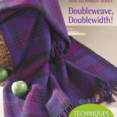 A plaid woven blanket in shades of purple, red, and green is draped over a surface with two green apples nearby. The text reads "Best of Handwoven, Doubleweave, Doublewidth! eBook (Printed version) by Long Thread Media: Discover Techniques + 10 Weaving Projects.