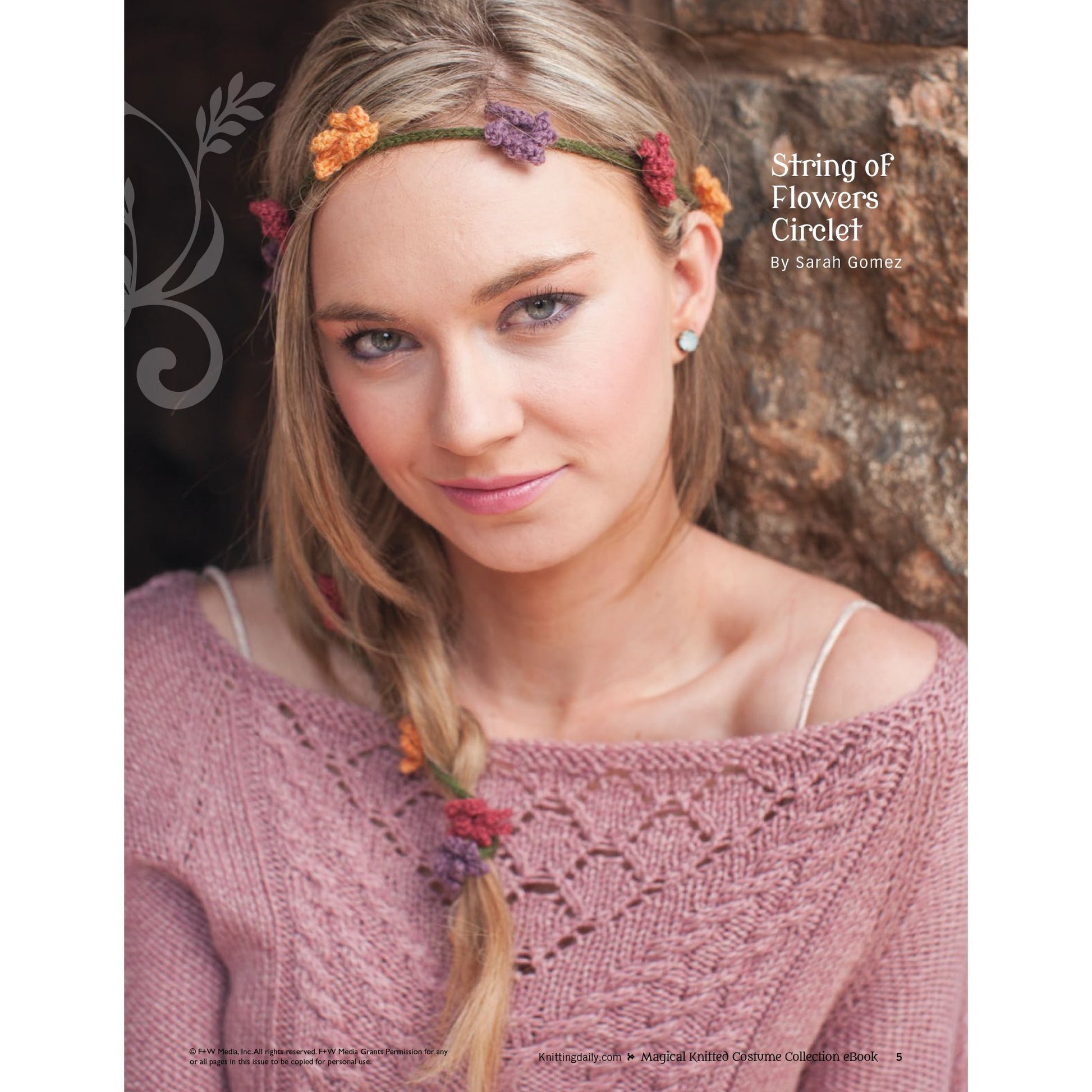 A woman with long blonde hair is adorned with a floral headband. She wears a pink crocheted top and has a small braid in her hair. The background showcases a rustic, stone-like texture. Text on the image reads, "Magical Knitted Costume Collection – eBook printed copy by Long Thread Media.