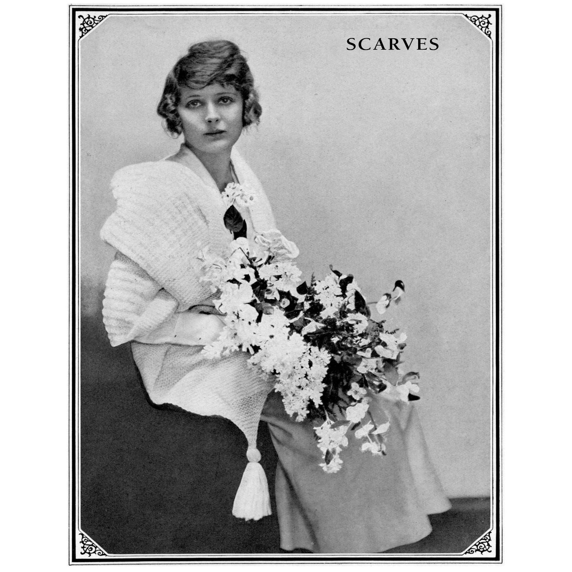 A vintage black-and-white photo captures a woman sitting down, adorned with a knitted scarf draped over her shoulders. She holds a large bouquet of flowers and gazes slightly to the side. At the top right, the words "7 Stylish Scarves from 1918 to Knit – eBook printed copy" by Long Thread Media are prominently displayed. The photo is elegantly framed with ornate corner detailing.